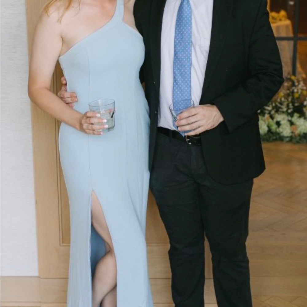 Light blue gown, only worn twice. Slit leg